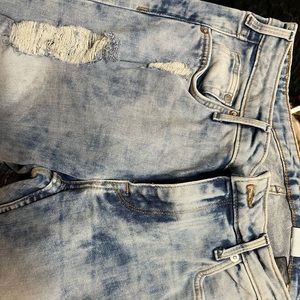 Acid wash distressed stretch skinny jean